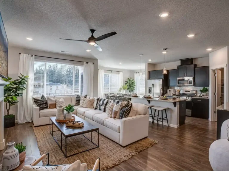 Living room dining room combo layout with warm neutral decor and open-plan furniture