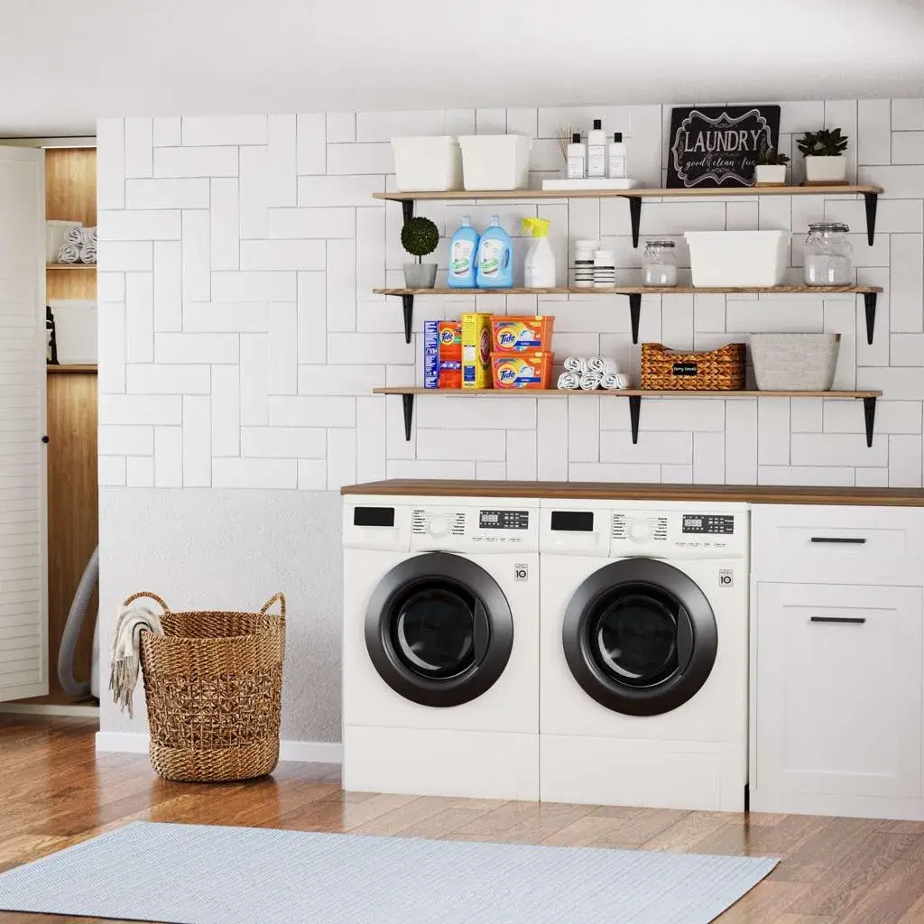 Laundry room with floating wooden shelves, detergent jars, baskets, and folded towels